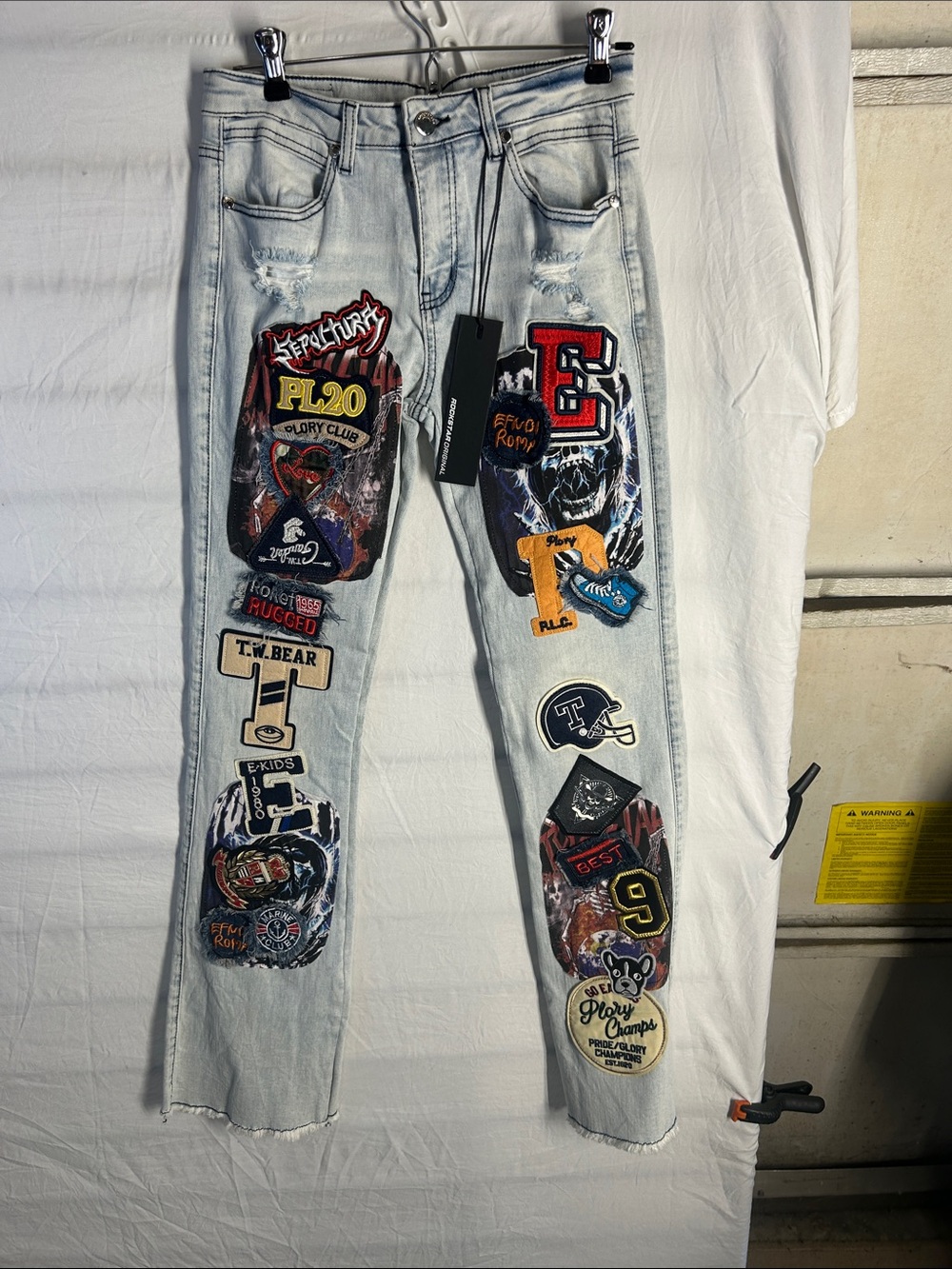 Light Blue Patchwork Bootcut Jeans with Graphic Patches